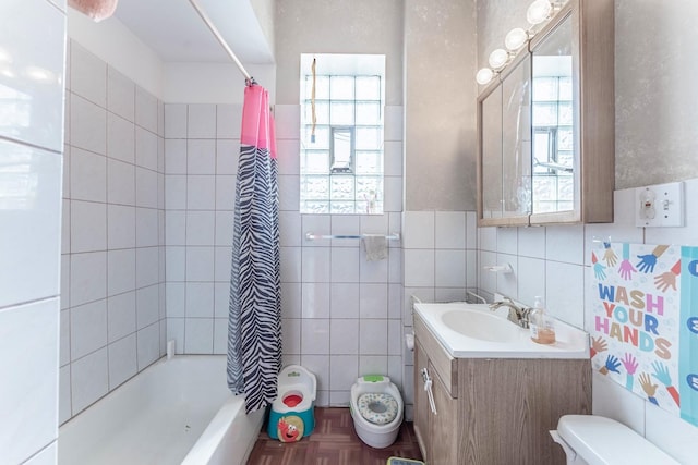 3605 W Cermak Rd, Chicago, IL 60623 - bathroom featuring tile walls, vanity, and shower / bath combination with curtain