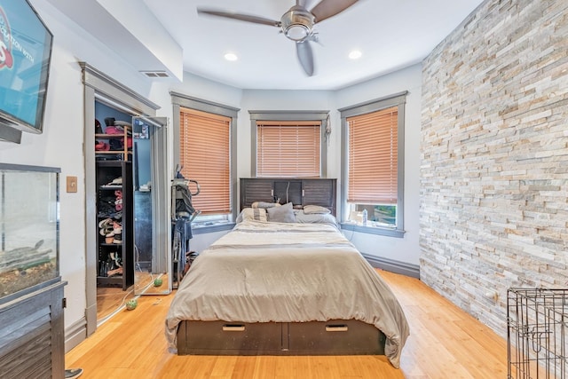 3605 W Cermak Rd, Chicago, IL 60623 - bedroom with wood finished floors, recessed lighting, and ceiling fan
