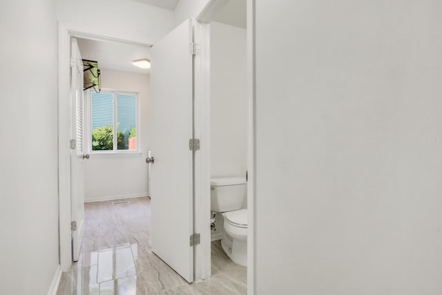 1379 Clavey Ln, Gurnee, IL 60031 - bathroom with marble look tile flooring and toilet
