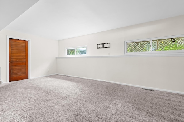4809 Cayuga Rd, Rockford, IL 61107 - carpeted empty room with baseboards