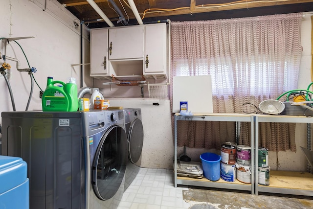 4809 Cayuga Rd, Rockford, IL 61107 - laundry room with cabinet space and washing machine and clothes dryer