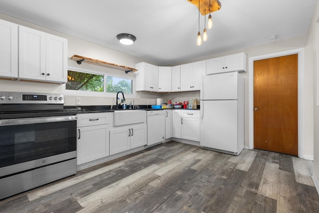 4809 Cayuga Rd, Rockford, IL 61107 - kitchen featuring white appliances, wood finished floors, and white cabinetry