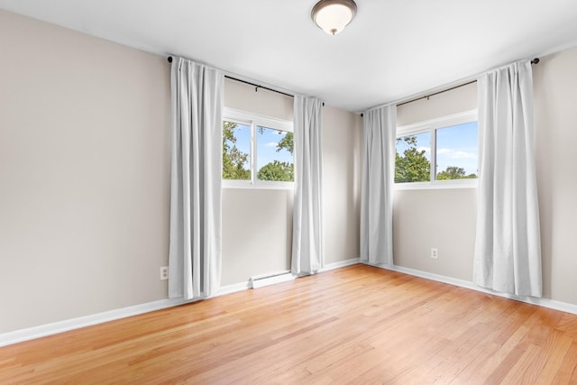 4809 Cayuga Rd, Rockford, IL 61107 - unfurnished room featuring light wood-type flooring and baseboards