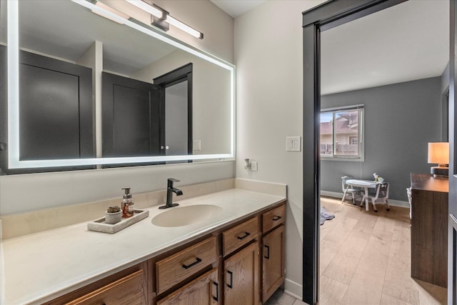 1617 Addleman St, Joliet, IL 60431 - bathroom featuring vanity and wood finished floors