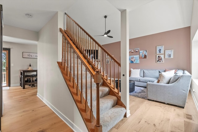 1617 Addleman St, Joliet, IL 60431 - staircase featuring wood finished floors and ceiling fan