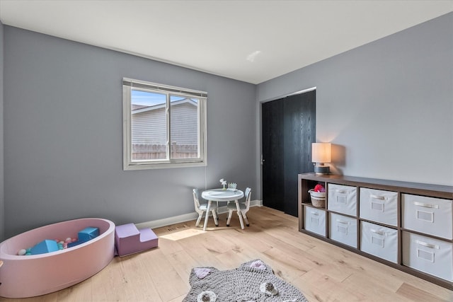 1617 Addleman St, Joliet, IL 60431 - playroom with wood finished floors and baseboards