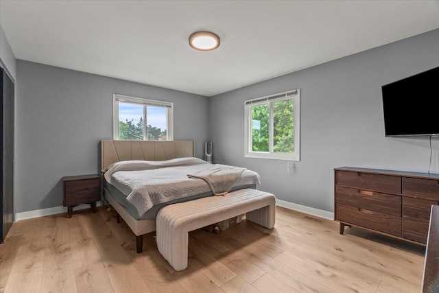 1617 Addleman St, Joliet, IL 60431 - bedroom with baseboards and light wood finished floors