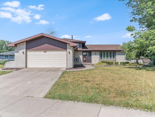 8564 Cherry Stone Pl, Tinley Park, IL 60487 - view of front of house featuring brick siding, a garage, driveway, and a front yard