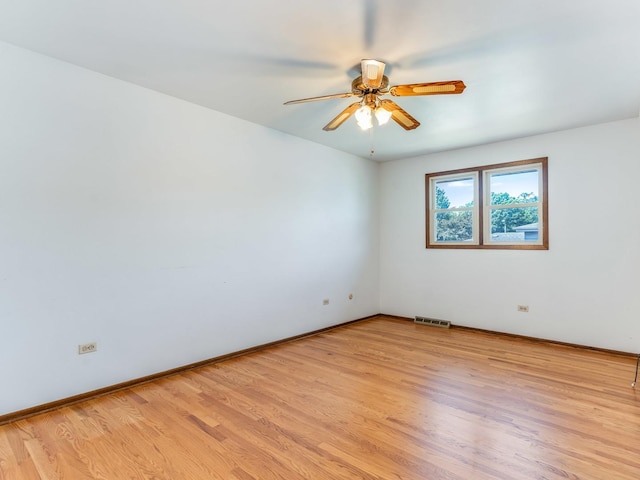 8564 Cherry Stone Pl, Tinley Park, IL 60487 - unfurnished room featuring ceiling fan and light wood finished floors
