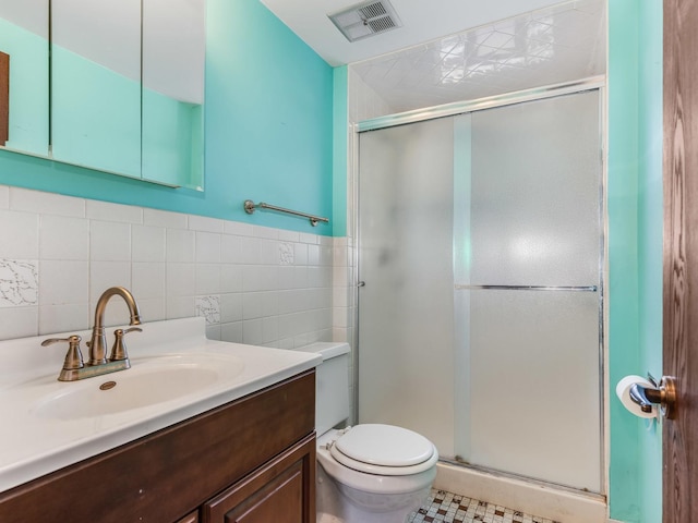 8564 Cherry Stone Pl, Tinley Park, IL 60487 - bathroom featuring a shower stall, vanity, and tile walls