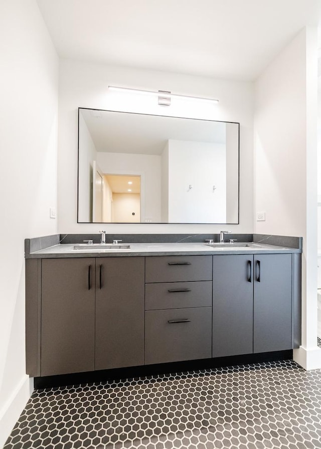 2715 Reese Ave, Evanston, IL 60201 - bathroom featuring double vanity and baseboards