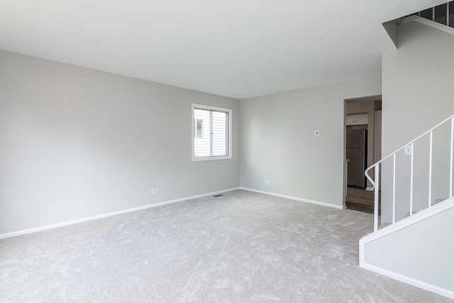 1302 Haverhill Cir, Naperville, IL 60563 - carpeted spare room with stairs and baseboards