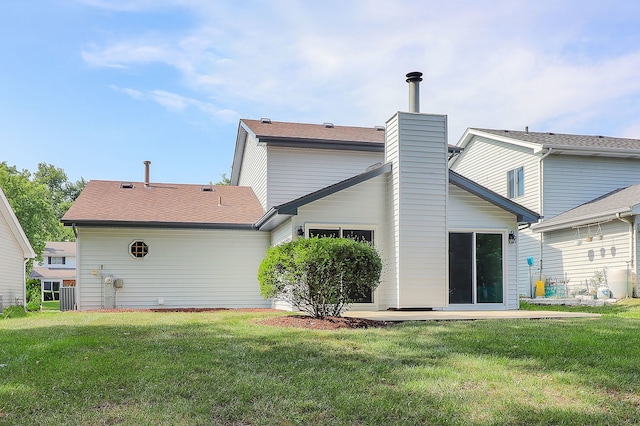 1302 Haverhill Cir, Naperville, IL 60563 - back of property featuring a lawn and a chimney