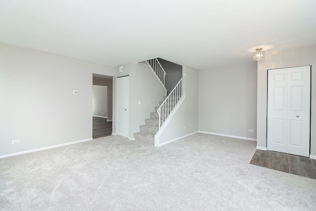 1302 Haverhill Cir, Naperville, IL 60563 - unfurnished living room featuring stairs and carpet floors