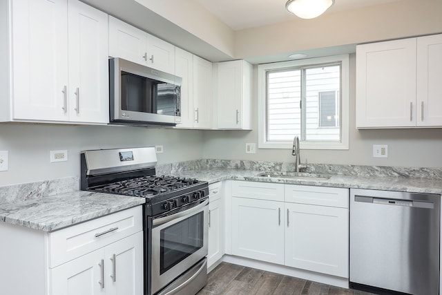 1302 Haverhill Cir, Naperville, IL 60563 - kitchen featuring appliances with stainless steel finishes, white cabinetry, and dark wood-style flooring