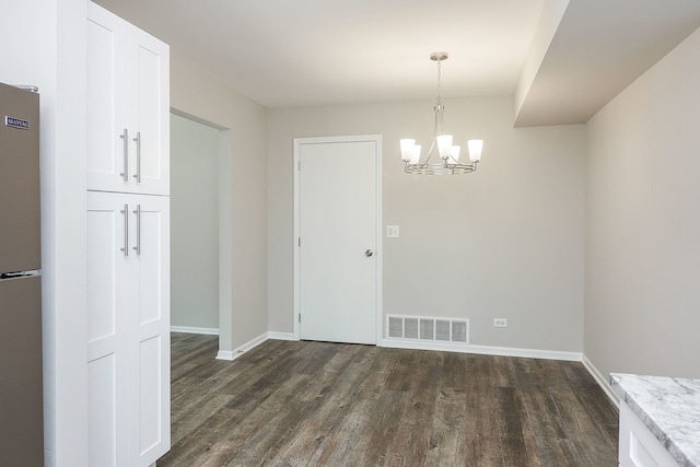 1302 Haverhill Cir, Naperville, IL 60563 - unfurnished dining area featuring dark wood-style floors and a chandelier