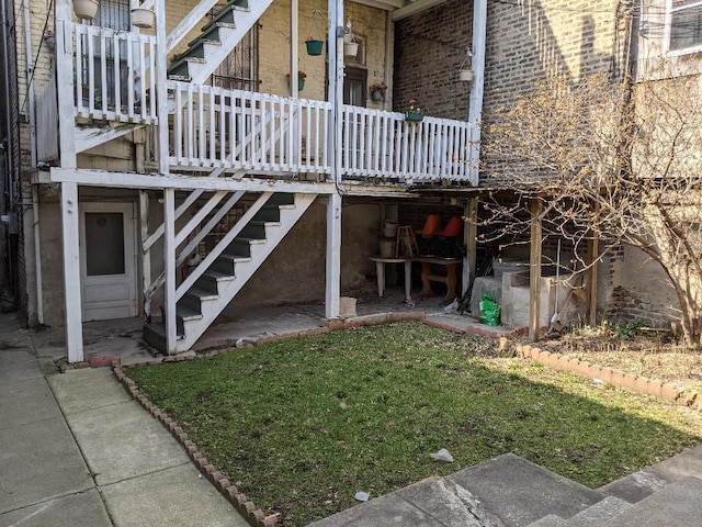 1817 S Ashland Ave, Chicago, IL 60608 - view of home's exterior with stairway and a yard
