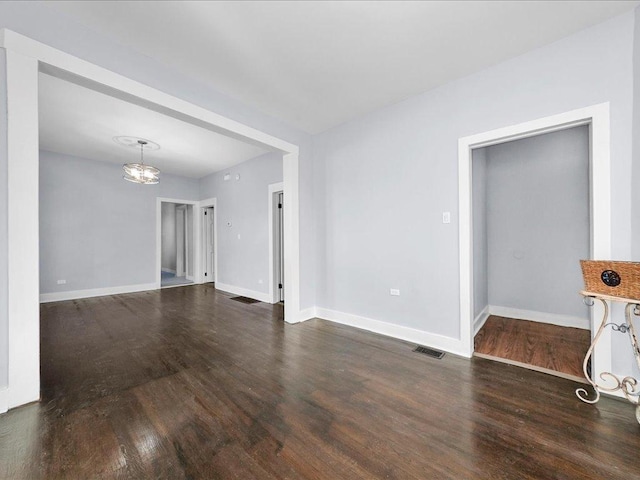 6501 S Hamilton Ave, Chicago, IL 60636 - empty room featuring wood finished floors and a chandelier