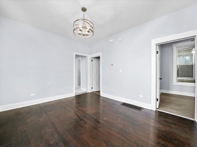 6501 S Hamilton Ave, Chicago, IL 60636 - empty room with a chandelier and wood finished floors