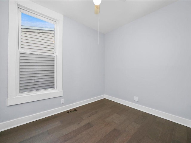 6501 S Hamilton Ave, Chicago, IL 60636 - spare room with dark wood-style floors and baseboards