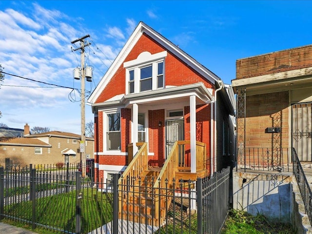 6501 S Hamilton Ave, Chicago, IL 60636 - view of front of property with brick siding and a fenced front yard