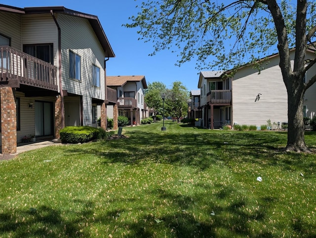 1340 Kingsbury Dr Unit 2, Hanover Park, IL 60133 - view of green lawn with a residential view