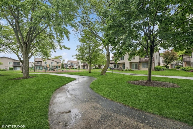 1340 Kingsbury Dr Unit 2, Hanover Park, IL 60133 - view of property's community with a residential view and a yard