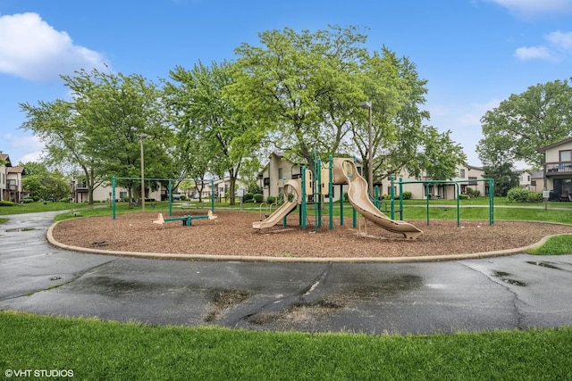 1340 Kingsbury Dr Unit 2, Hanover Park, IL 60133 - community playground featuring a residential view