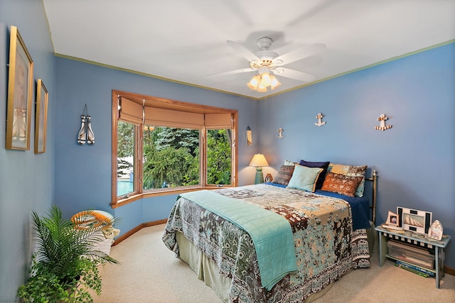 1606 Gregden Shores Dr, Sterling, IL 61081 - bedroom featuring carpet, a ceiling fan, and crown molding