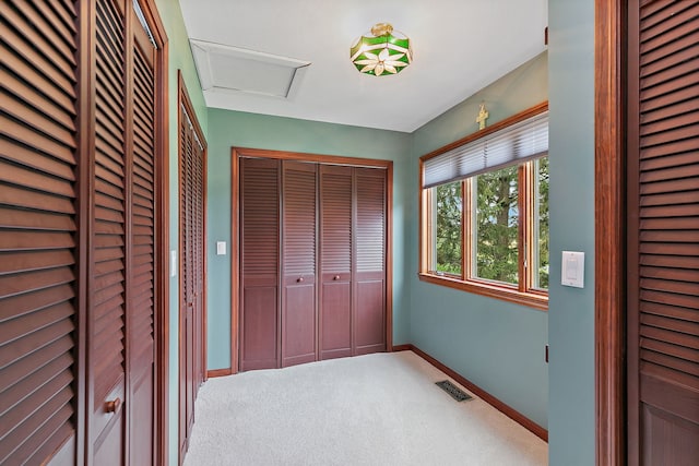 1606 Gregden Shores Dr, Sterling, IL 61081 - unfurnished bedroom with baseboards and light carpet