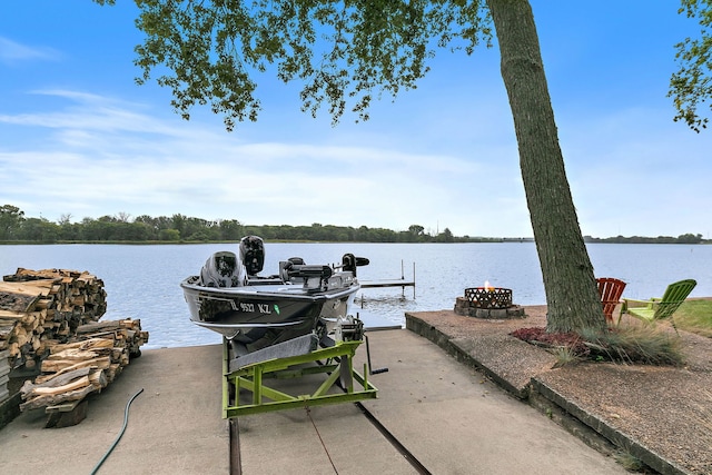 1606 Gregden Shores Dr, Sterling, IL 61081 - dock with a water view and a fire pit