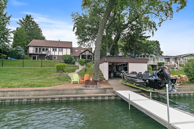 1606 Gregden Shores Dr, Sterling, IL 61081 - dock with an outdoor fire pit and a water view