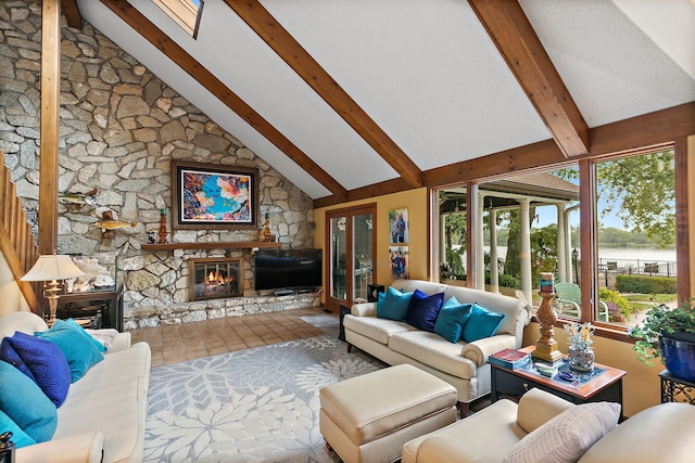 1606 Gregden Shores Dr, Sterling, IL 61081 - living room featuring beamed ceiling, a stone fireplace, and high vaulted ceiling