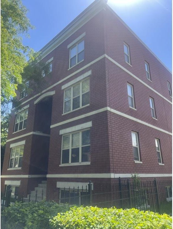 6528 S University Ave Unit 3S, Chicago, IL 60637 - view of side of home with brick siding