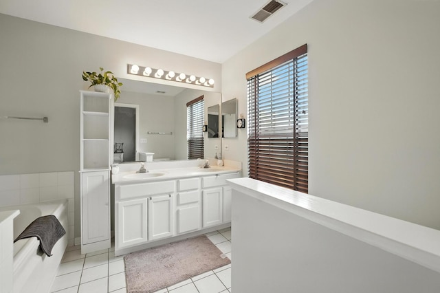 186 Willow Blvd, Willow Springs, IL 60480 - bathroom featuring a bath, double vanity, and tile patterned flooring