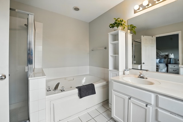 186 Willow Blvd, Willow Springs, IL 60480 - full bath with vanity, a jetted tub, a stall shower, connected bathroom, and tile patterned flooring