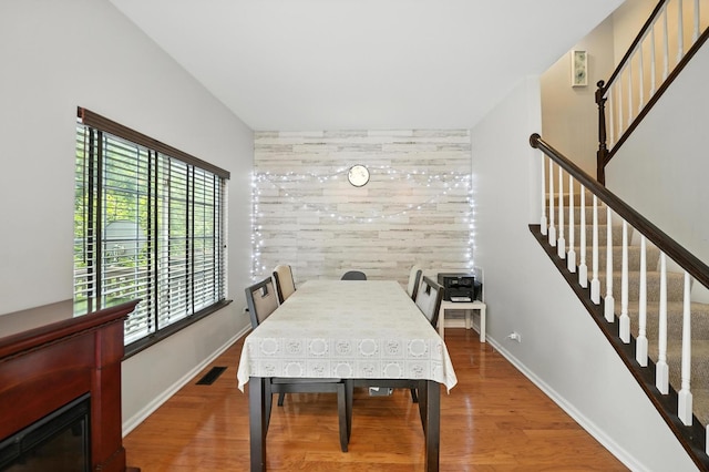 186 Willow Blvd, Willow Springs, IL 60480 - dining area with stairs, wood finished floors, and tile walls