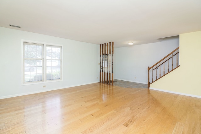 1918 N Yale Ave, Arlington Heights, IL 60004 - spare room with light wood finished floors and stairs