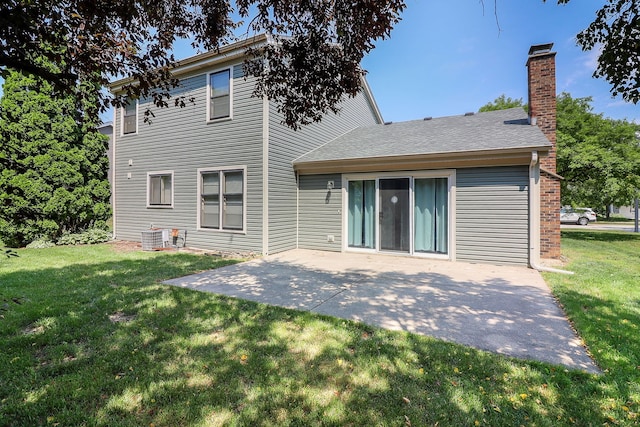 1918 N Yale Ave, Arlington Heights, IL 60004 - rear view of house featuring a yard, a patio, and a chimney