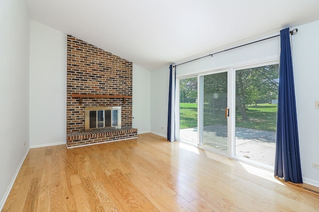 1918 N Yale Ave, Arlington Heights, IL 60004 - unfurnished living room with wood finished floors, lofted ceiling, and a fireplace