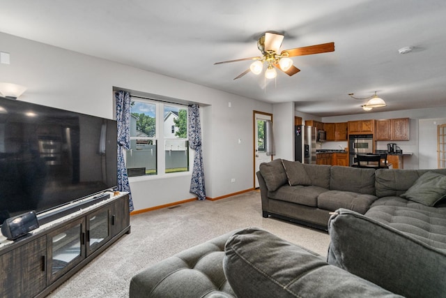 5505 Salma St, Plainfield, IL 60586 - living area featuring light colored carpet and a ceiling fan