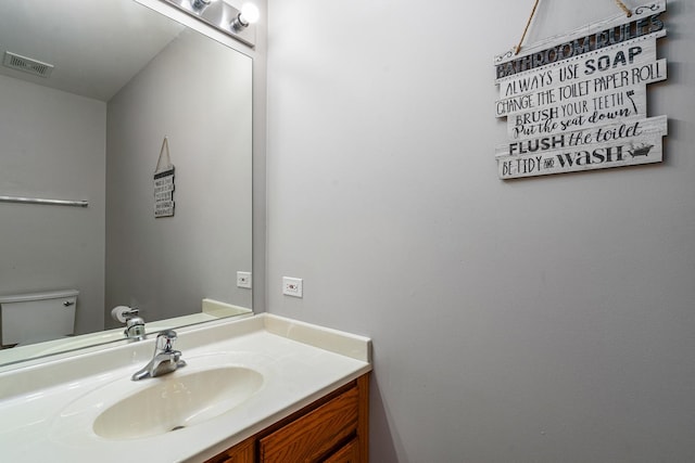 5505 Salma St, Plainfield, IL 60586 - half bathroom featuring vanity and toilet