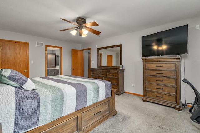5505 Salma St, Plainfield, IL 60586 - bedroom featuring light colored carpet, connected bathroom, and ceiling fan