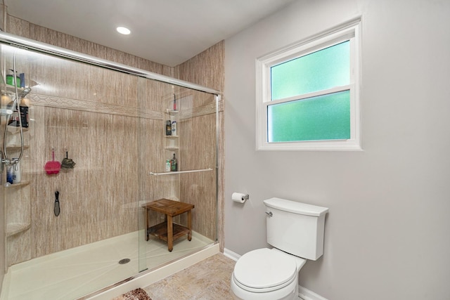 5505 Salma St, Plainfield, IL 60586 - bathroom featuring a shower stall and tile patterned flooring