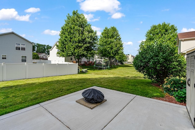 5505 Salma St, Plainfield, IL 60586 - view of patio featuring a trampoline, a fire pit, and a residential view