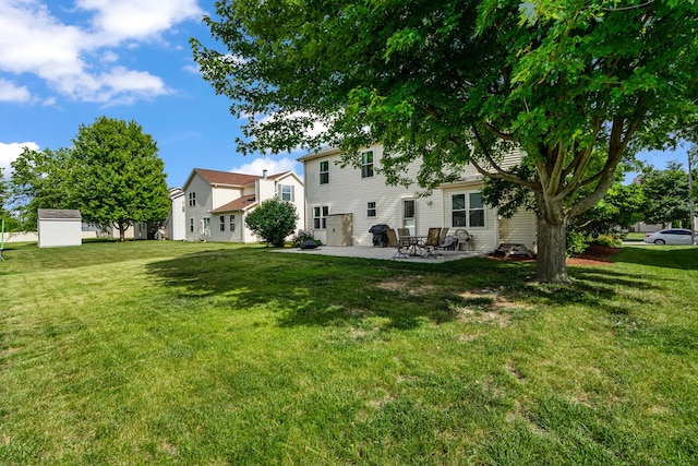 5505 Salma St, Plainfield, IL 60586 - back of house with a patio, a lawn, and a shed