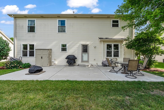 5505 Salma St, Plainfield, IL 60586 - back of house featuring a lawn and a patio