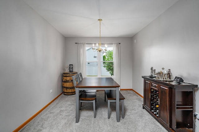 5505 Salma St, Plainfield, IL 60586 - carpeted dining space featuring a chandelier and bar area