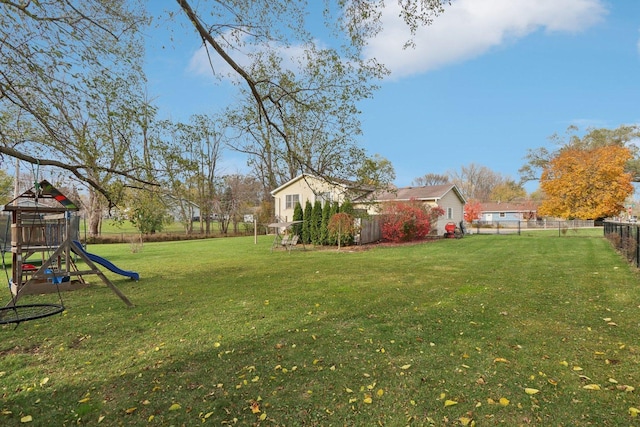 9997 W Paddock Ave, Beach Park, IL 60087 - fenced backyard featuring a playground