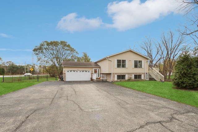 9997 W Paddock Ave, Beach Park, IL 60087 - split level home with driveway, an attached garage, and stairway